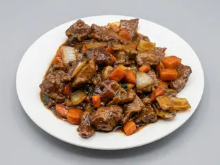 Ternera Con Salsa De Ostras