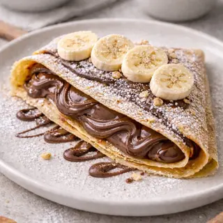 Crepes banana y salsa + 1 zumo saludable (16 oz.)