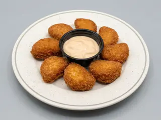 Nuggets de pechuga de pollo . 8 unidades