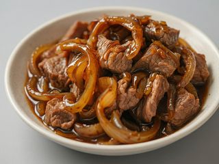 Ternera con cebollas