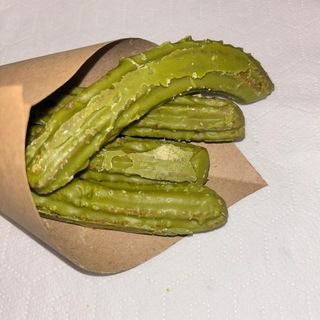Churros Cubiertos de Pistacho (4 Unidades).