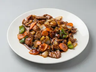 Ternera Con Salsa De Ostras
