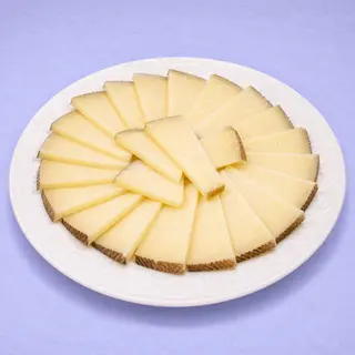 Queso D.O. Manchego Curado (1 ración)