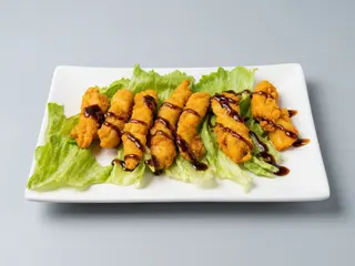 Stick de pollo con salsa teriyaki