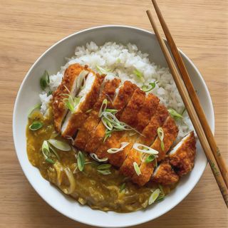 Arròs, salsa curri i ànec amb salsa teriyaki