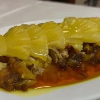 63.- Pato con Piña