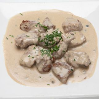 Dados de filete de Ternera a la Pimienta Verde