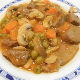 Ternera con champiñones