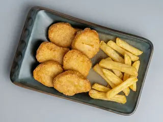 NUGGETS DE POLLO.  12 UD.