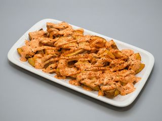 Ración De Patatas Bravas