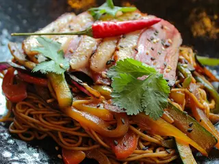 Wok de magret de pato