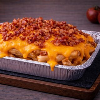 Patatas con cheddar y bacon