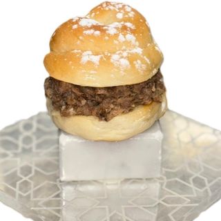 Ensaimada rellena de la pringá trufada del cocido (2 Uds)