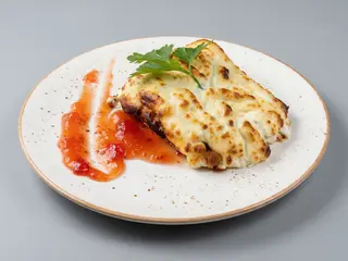 Bacalao Gratinado Con Muselina De Ajo Y Compota De Tomate