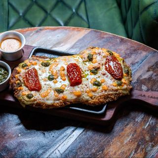 Milanesa Argentina Gratinada Al Horno De Leña De Pollo O Ternera