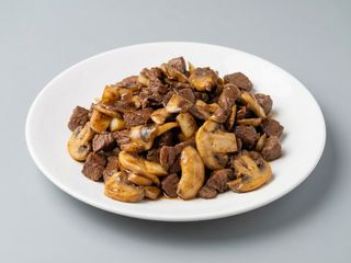 Ternera Con Champiñones