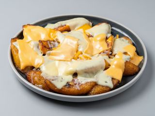Ración De Plátanao Maduro Con Queso Gratinado