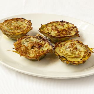 Alcachofas floreadas a la escama de sal