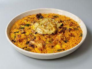 Arroz De Verduras De Temporada y capón.