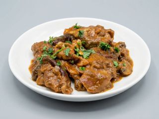 Pierna De Cabrito Al Horno Deshuesada
