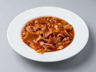 Oreja Con Tomate Y Salsa Ají