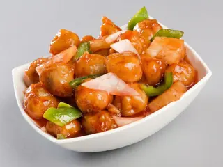 60. Cerdo con salsa agridulce