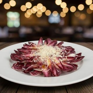 Endivias galas con virutas de queso y dulce de frutos del bosque