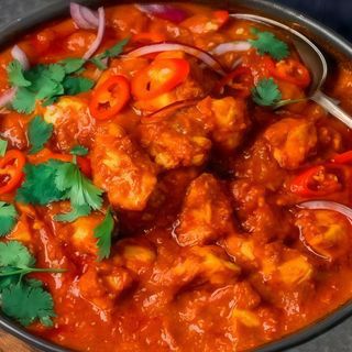 Cordero balti con garbanzos