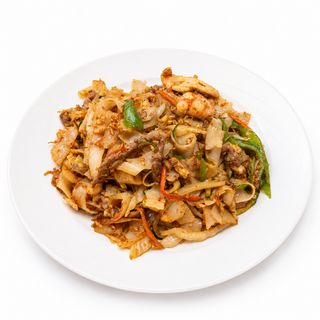 39E.Tallarines de arroz salteados tres delicias