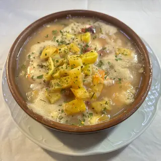 Pulpo con langostinos ajillo