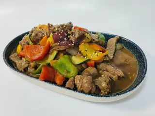 Wok de solomillo