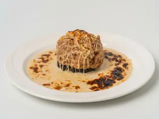Berenjena Rellenada De Carne Gratinada con bechamel 