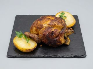 Medio pollo a la leña