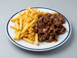Ternera A La Plancha Con Patatas Fritas