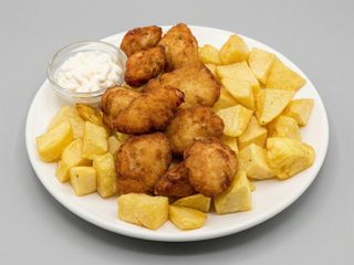Lagrimitas de pollo caseras al limón con patatas