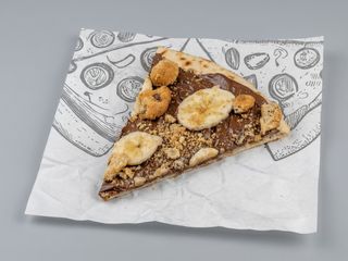 Pizza de Nutella con plátano y cookies (28 Cm.)