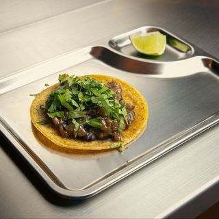 Taco Encebollado