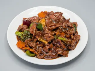 Láminas De Ternera En Salsa De Ostras