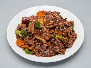 Láminas De Ternera En Salsa De Ostras