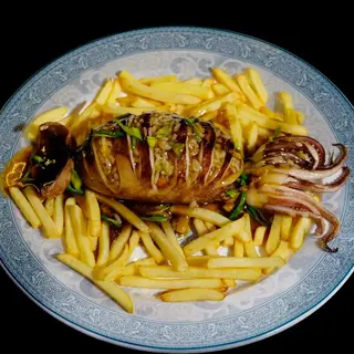 Calamares Envueltos En Arroz Con Salsa De Soja