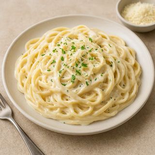 Espaguetis con crema de queso