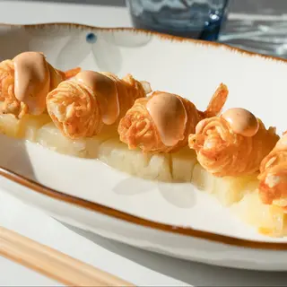 Langostino envuelto en hilo de patata con fruta (5ud)