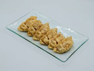 Gyozas de Pato al Vapor con Salsa Teriyaki y Sésamo