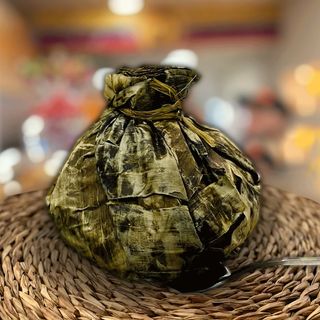 Tamal Tolimense con 2 mini arepas