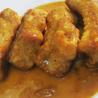 Ración de costilla de cerdo guisadas