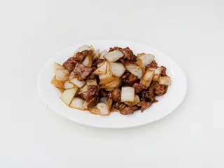 Ternera con cebolla