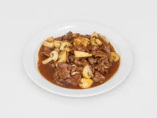 Ternera con champiñones 