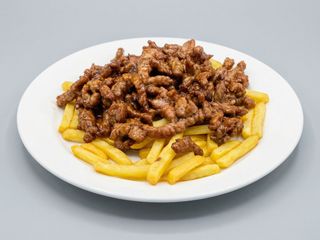 ternera con patatas fritas
