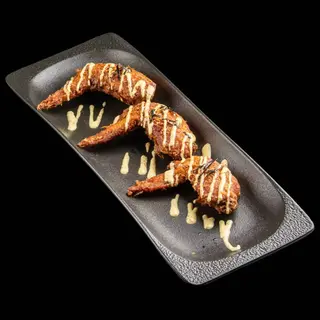 31. Alitas de pollo (4 Uds.)
