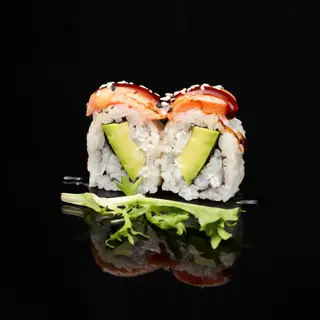 u134. Uramaki salmon flambeado aguacate y queso (8 Uds.)